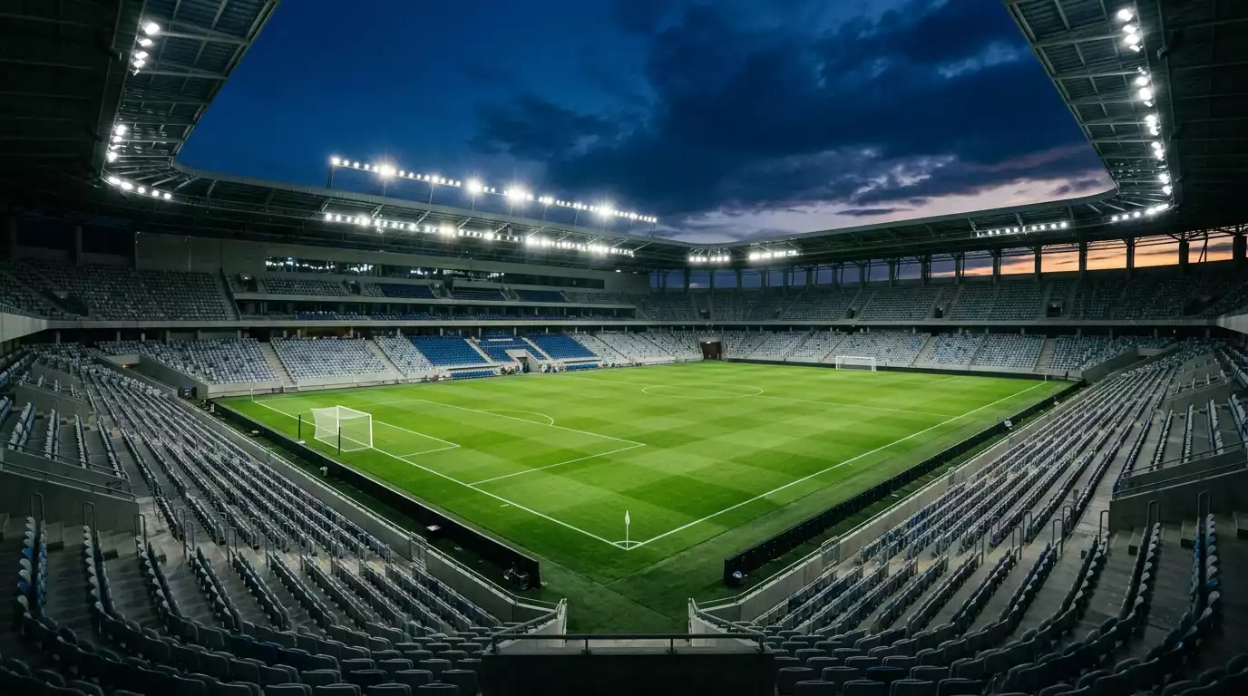 Sfeerbeeld van een WK 2026-stadion bij avond aan de vooravond van de knock-outfase